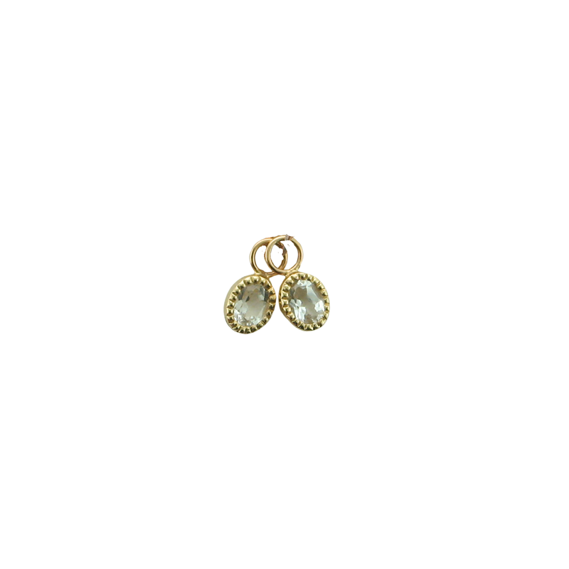 10KY WHITE TOPAZ OVAL CHARM