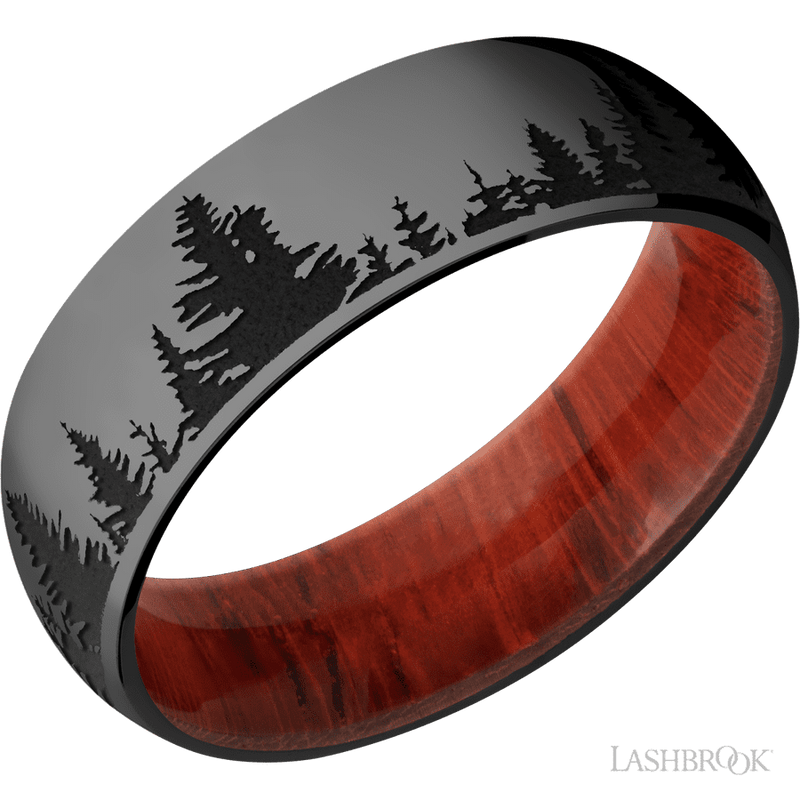 7 mm wide/Domed/Zirconium band with a laser carved Trees pattern also featuring a Padauk sleeve.