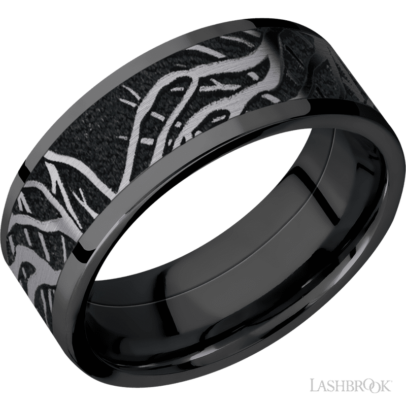 8 mm wide/Flat/Zirconium band with one 6 mm Centered inlay of Tantalum with a laser carved Branches pattern.