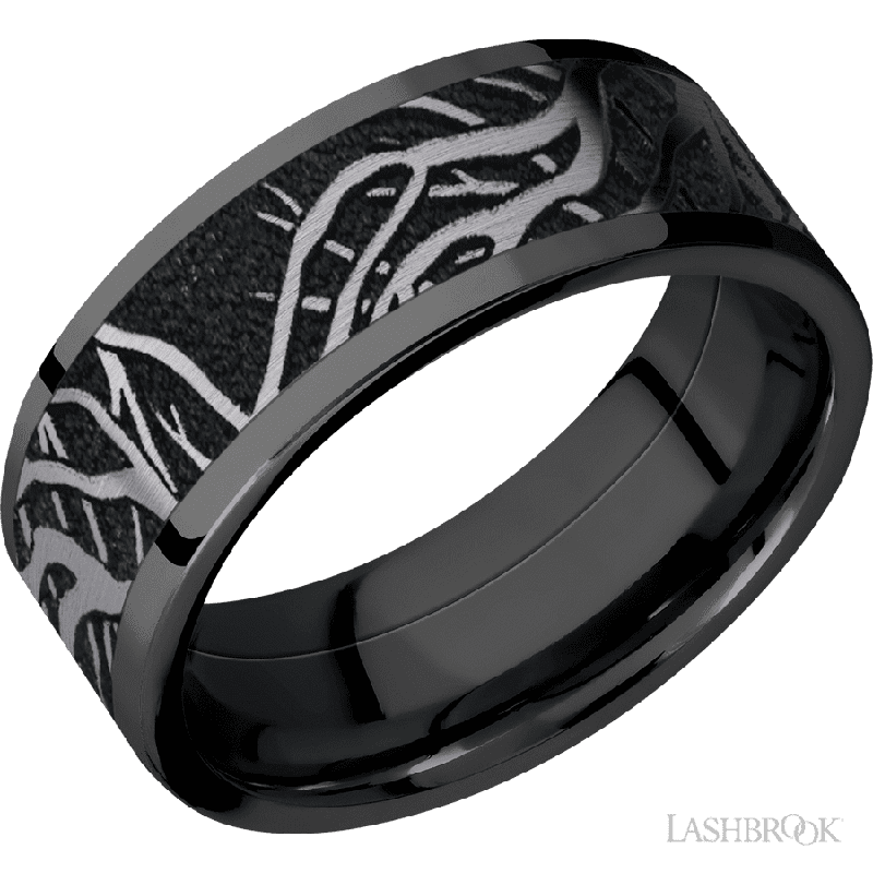 8 mm wide/Flat/Zirconium band with one 6 mm Centered inlay of Tantalum with a laser carved Branches pattern.