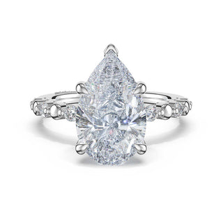 Round Pattern Pear Solitaire Engagement Ring in Platinum