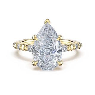 Round Pattern Pear Solitaire Engagement Ring in 14kt Yellow Gold