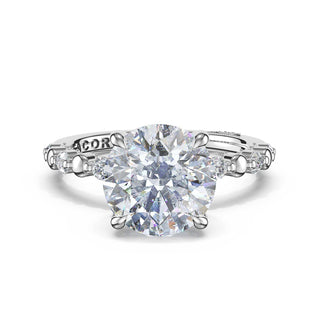 Round Pattern Round Solitaire Engagement Ring in Platinum