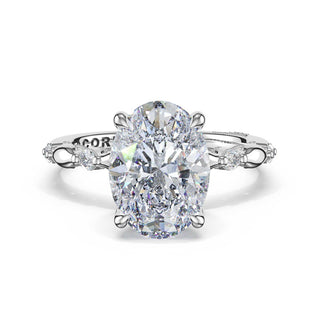 Mixed Pattern Oval Solitaire Engagement Ring in 18kt White Gold