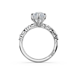Mixed Pattern Pear Solitaire Engagement Ring in Platinum