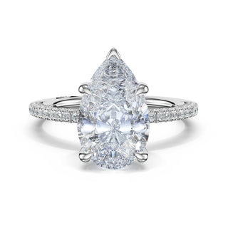 Half-Pavé Pear Solitaire Engagement Ring in Platinum