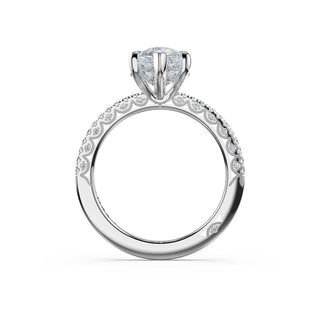 Half-Pavé Pear Solitaire Engagement Ring in Platinum