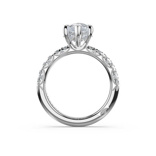 Half-Pavé Pear Solitaire Engagement Ring in Platinum