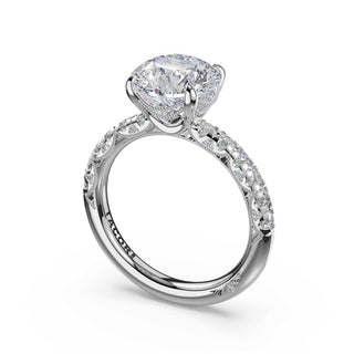 Half-Pavé Round Solitaire Engagement Ring in Platinum