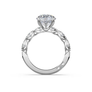 Sculptural Round Solitaire Engagement Ring in Platinum