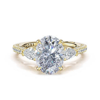 3-Stone Pear Diamond Side Oval Engagement Ring in 18kt Yellow Gold