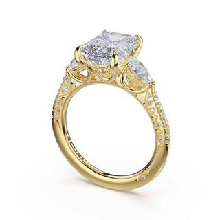 3-Stone Pear Diamond Side Emerald Engagement Ring in 14kt Yellow Gold