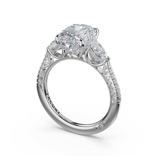 3-Stone Pear Diamond Side Oval Engagement Ring in Platinum