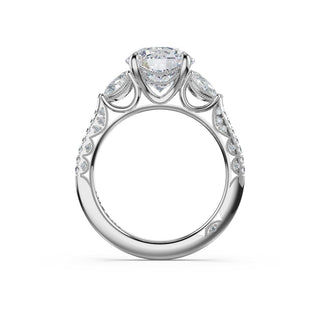 3-Stone Pear Diamond Side Round Engagement Ring in Platinum