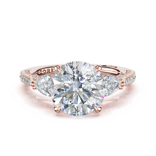 3-Stone Pear Diamond Side Round Engagement Ring in 14kt Rose Gold