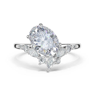 3-Stone Pear Diamond Side Oval Engagement Ring in Platinum