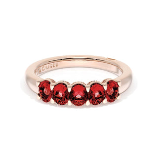 Oval Cut Ruby Eternity Band in 14kt Rose Gold