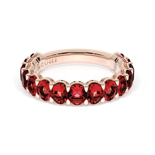 Oval Cut Ruby Eternity Band in 14kt Rose Gold