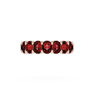 Oval Cut Ruby Eternity Band in 14kt Rose Gold