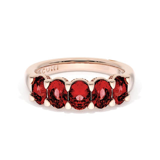 Oval Cut Ruby Eternity Band in 14kt Rose Gold