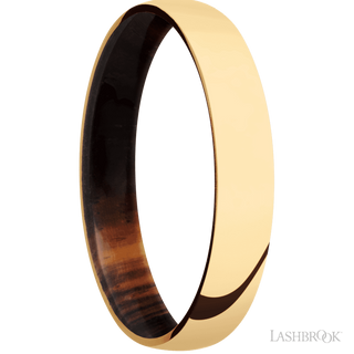 4 mm wide Domed 14K Yellow Gold band featuring a Cocobolo sleeve.
