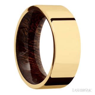 8 mm wide Flat 14K Yellow Gold band featuring a Sapele sleeve.