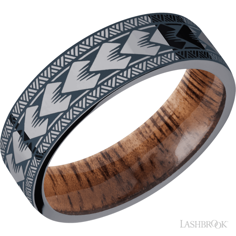 7 mm wide/Flat/Tantalum band with a laser carved Maori pattern also featuring a Koa sleeve.