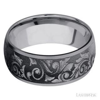 9 mm wide/Domed/Tantalum band with a laser carved Western Scroll pattern.