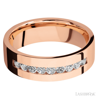 7 mm wide/Flat/14K Rose Gold band with an  arrangement of 9, .05 carat Round Diamond stones in a Channel setting.