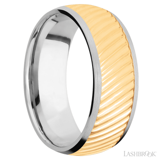 8 mm wide/Domed/14K White Gold band with one 6 mm Centered inlay of 14K Yellow Gold with a machined Ripple pattern.