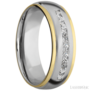 7 mm wide/Domed Stepped Down Edges/Cobalt Chrome band with an  arrangement of 9, .05 carat Round Lab Grown Diamond stones in a Channel setting and featuring two 1 mm Edge inlays of 14K Yellow Gold