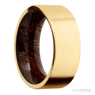 8 mm wide Flat 14K Yellow Gold band featuring a Sapele sleeve.