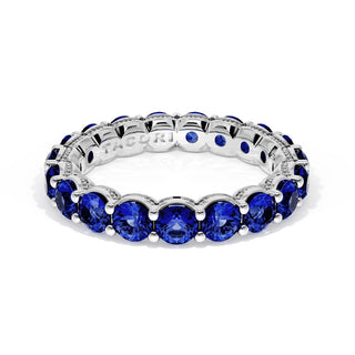 Round Cut Blue Sapphire Eternity Band in 18kt White Gold