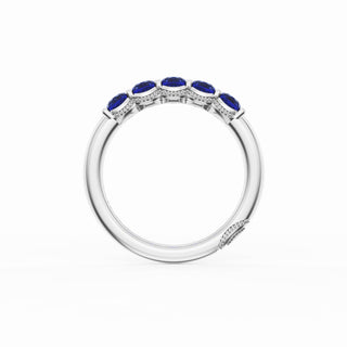Round Cut Blue Sapphire Eternity Band in 18kt White Gold