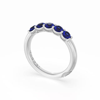 Round Cut Blue Sapphire Eternity Band in Platinum