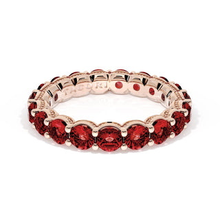 Round Cut Ruby Eternity Band in 14kt Rose Gold