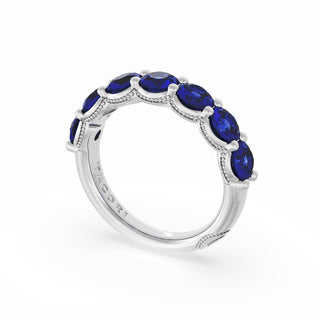 Round Cut Blue Sapphire Eternity Band in 18kt White Gold