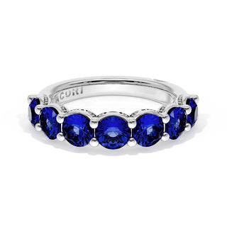 Round Cut Blue Sapphire Eternity Band in 18kt White Gold