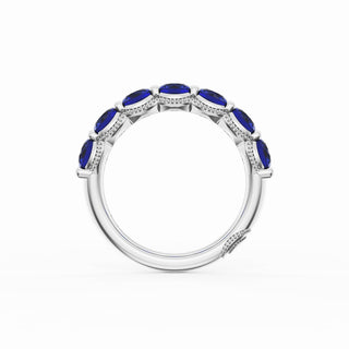 Round Cut Blue Sapphire Eternity Band in 18kt White Gold
