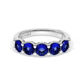 Round Cut Blue Sapphire Eternity Band in 18kt White Gold