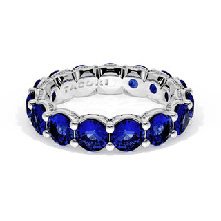 Round Cut Blue Sapphire Eternity Band in Platinum