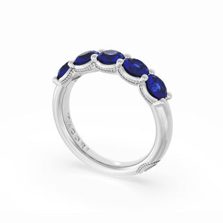 Round Cut Blue Sapphire Eternity Band in Platinum