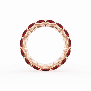 Round Cut Ruby Eternity Band in 18kt Rose Gold