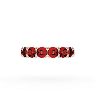Round Cut Ruby Eternity Band in 18kt Rose Gold