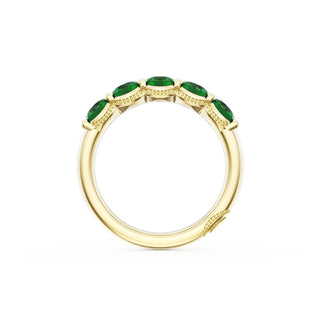 Round Cut Emerald Eternity Band in 18kt Yellow Gold