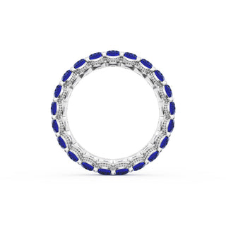 Oval Cut Blue Sapphire Eternity Band in 18kt White Gold