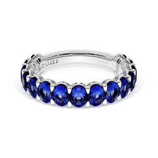 Oval Cut Blue Sapphire Eternity Band in 18kt White Gold