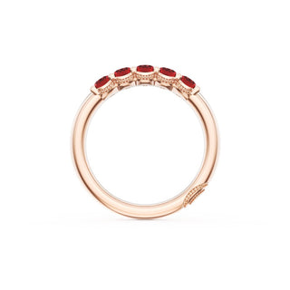 Oval Cut Ruby Eternity Band in 18kt Rose Gold