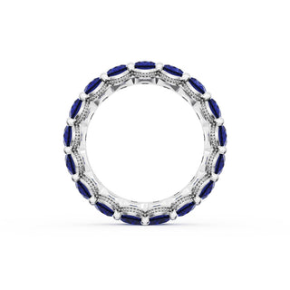 Oval Cut Blue Sapphire Eternity Band in 18kt White Gold