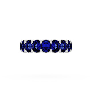 Oval Cut Blue Sapphire Eternity Band in 18kt White Gold